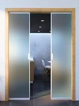 Porta in vetro nice luman doppio scorrevole a incasso intelaiata